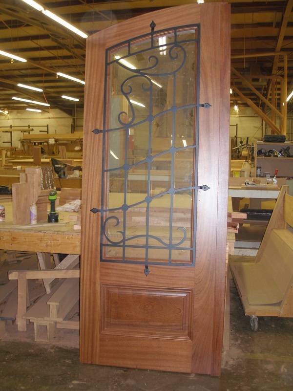 Custom wooden door with glass panel